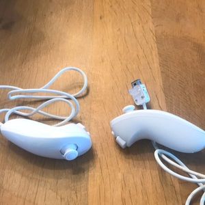 Wii Nunchuk controllers by Nintendo. Gently used.